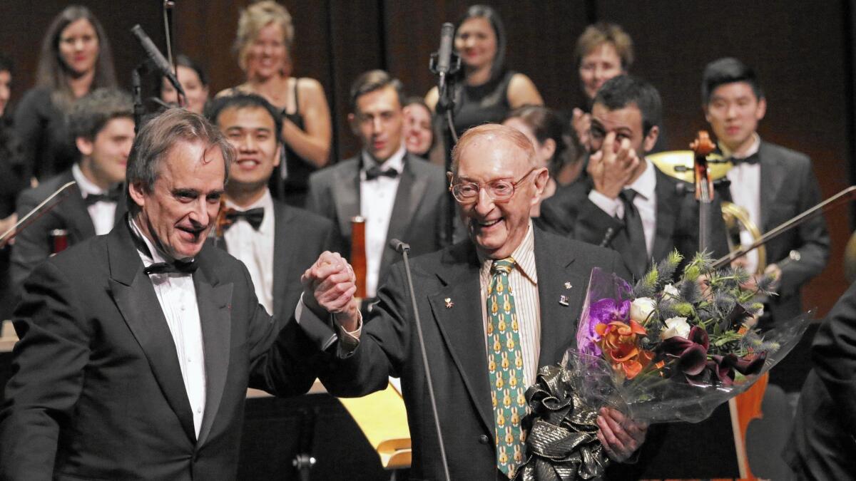 Los Angeles Opera’s James Conlon, left, pays tribute to composer Walter Arlen, the subject of “The Poet in Exile” at the Wallis, a collaboration between the Beverly Hills center and the Colburn School.