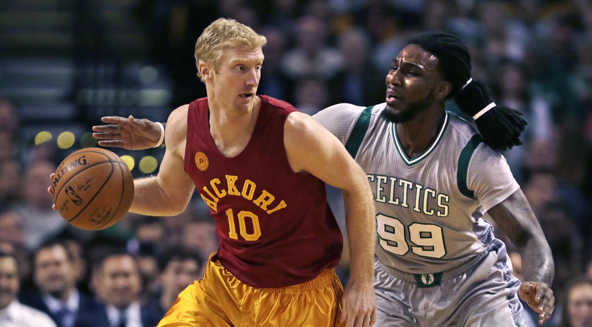 Indiana Pacers forward Chase Budinger, left, controls the ball in front of Boston Celtics forward Jae Crowder.