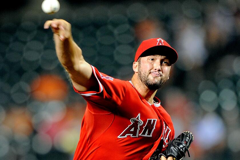 Huston Street pitches against the Baltimore Orioles at Camden Yards on July 31, 2014.