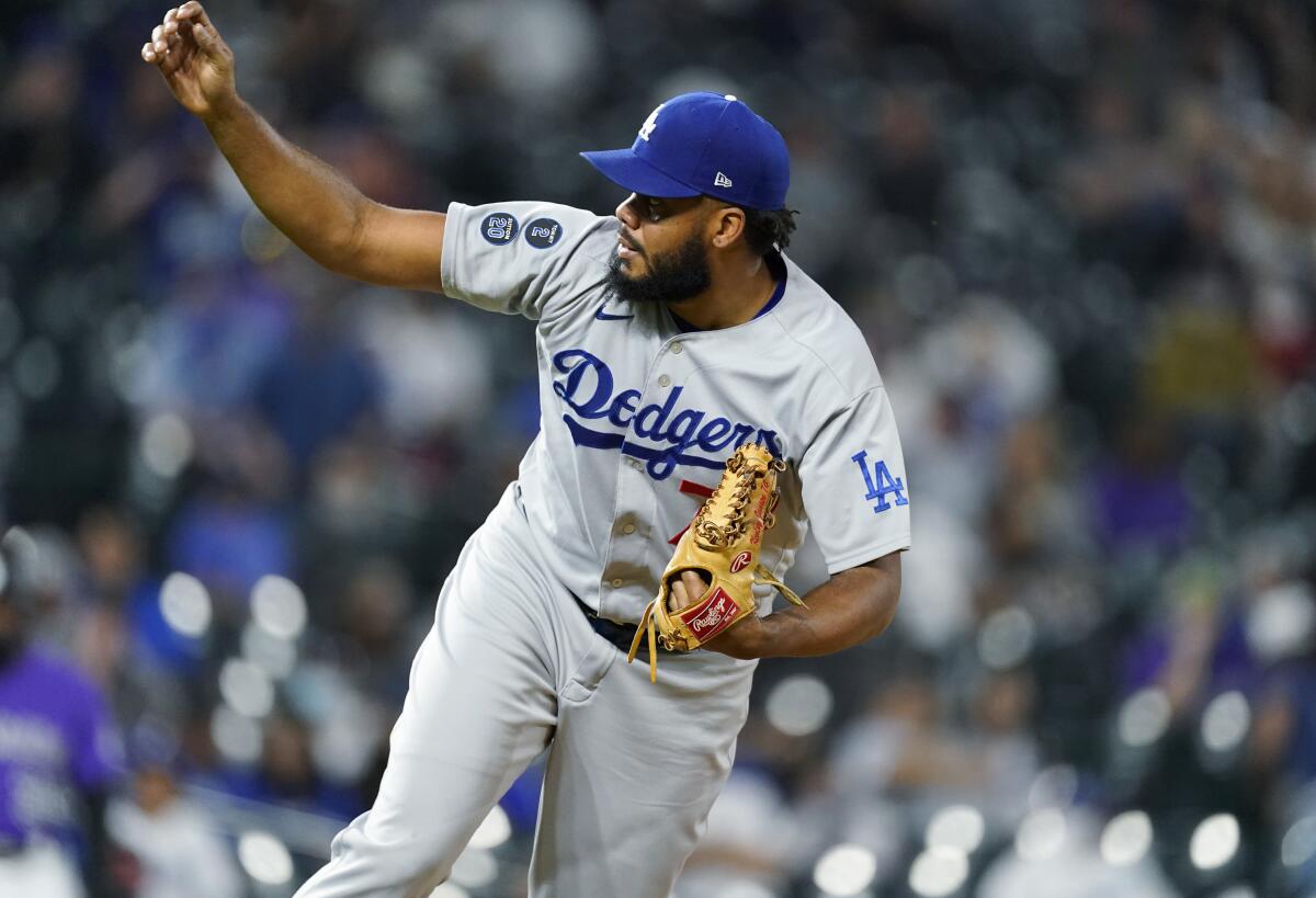 Dodgers reliever Kenley Jansen works against the Colorado Rockies in the ninth inning April 3, 2021, in Denver.