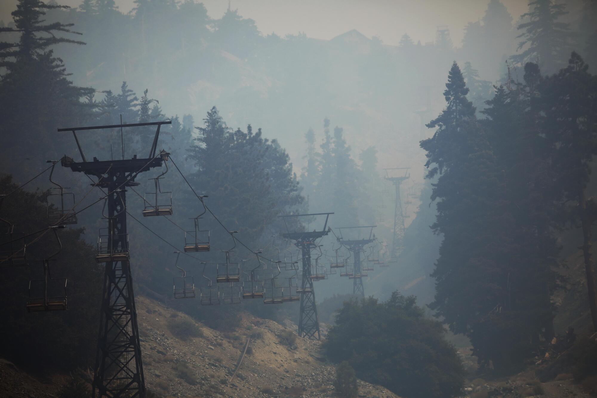 The Mount Baldy ski lifts are shrouded in smoke from the Bridge fire.