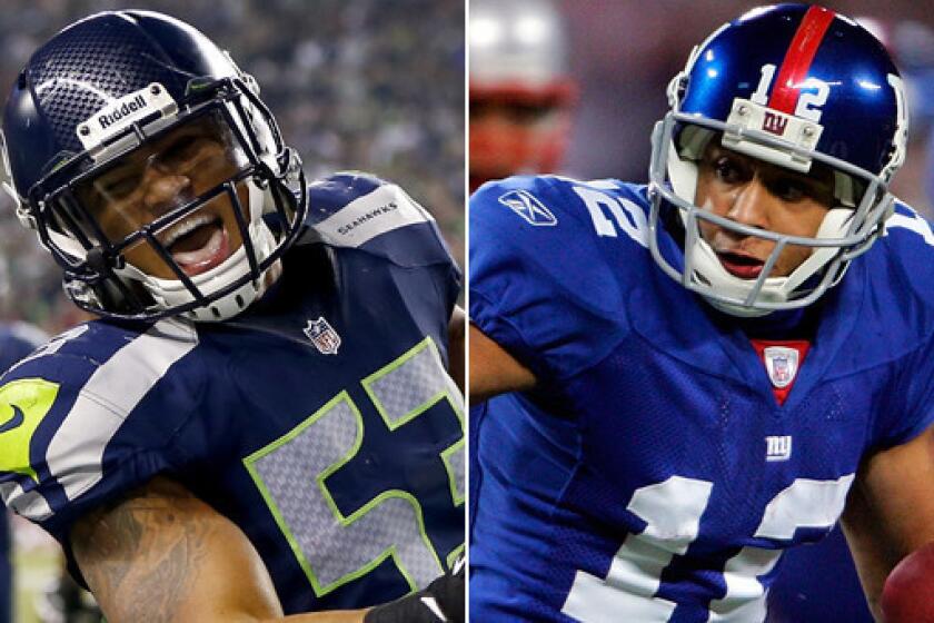 Seattle Seahawks linebacker Malcolm Smith, left, and former New York Giants wide receiver Steve Smith are on the verge of joining an elite group of brother combinations that have won Super Bowl titles.