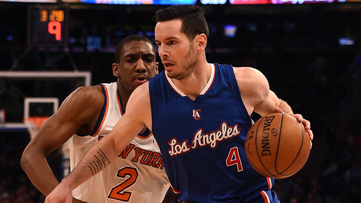 Clippers guard J.J. Redick drives past New York Knicks guard Langston Galloway during the Clippers' win on Wednesday.
