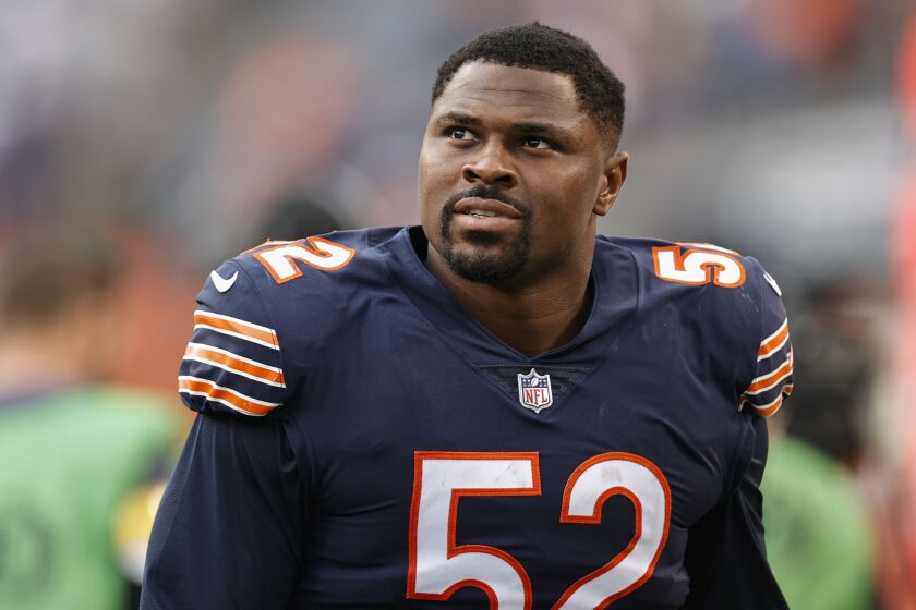 FILE - Chicago Bears' Khalil Mack walks off the field after an NFL football game.