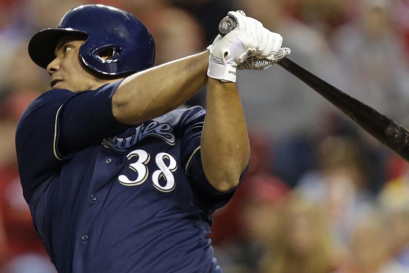 Milwaukee's Wily Peralta hits a two-run double against the Cincinnati Reds during the Brewers' 2-0 win Friday. The Brewers have fallen from No. 1 to No. 2 in this week's MLB rankings.