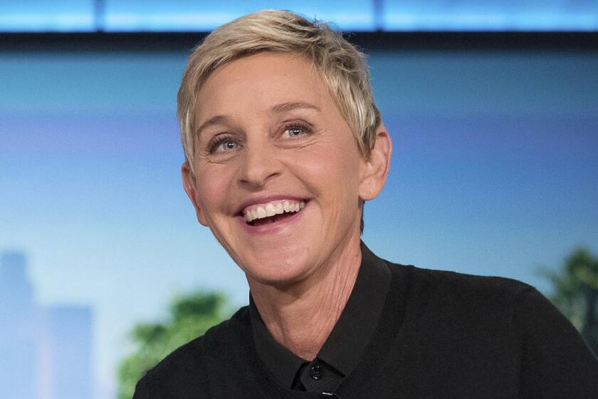 FILE - In this Oct. 13, 2016, file photo, Ellen Degeneres appears during a commercial break at a taping of "The Ellen Show" in Burbank. DeGeneres is known for keeping her comedy on the nice side. But she lets her inner meanie out for "Ellen's Game of Games." Thatâs NBC's new prime-time game show, which begins its regular run Tuesday, Jan. 2, 2018, after a December sneak peek. The hour-long show subjects its contestants to minor-league torments that, it turns out, delight host DeGeneres. (AP Photo/Andrew Harnik, File)