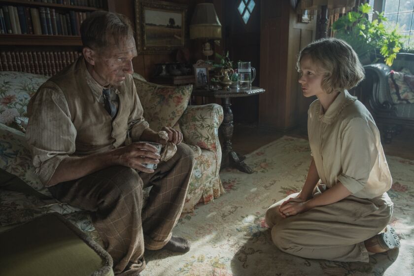 Ralph Fiennes and Carey Mulligan in the movie "The Dig."