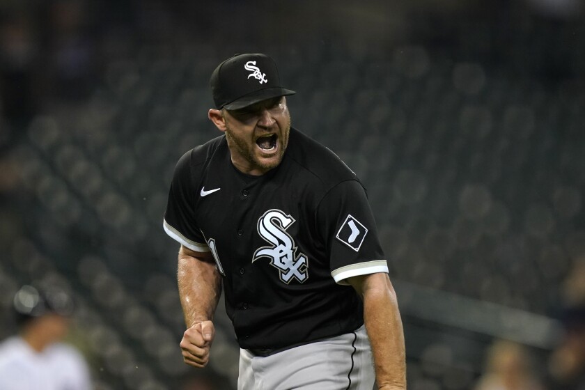 Chicago White Sox relief pitcher Liam Hendriks reacts after striking out Detroit Tigers' Niko Goodrum during the ninth inning of a baseball game, Friday, June 11, 2021, in Detroit. (AP Photo/Carlos Osorio)