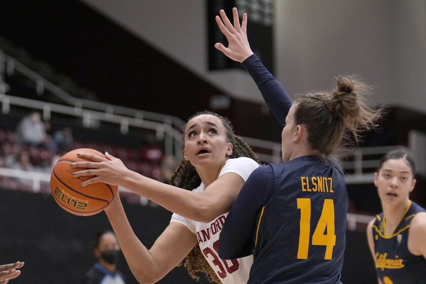 Stanford guard Haley Jones (30) looks to shoot against California guard Alma Elsnitz (14) during the first half of an NCAA college basketball game in Stanford, Calif., Friday, Jan. 21, 2022. (AP Photo/Tony Avelar)