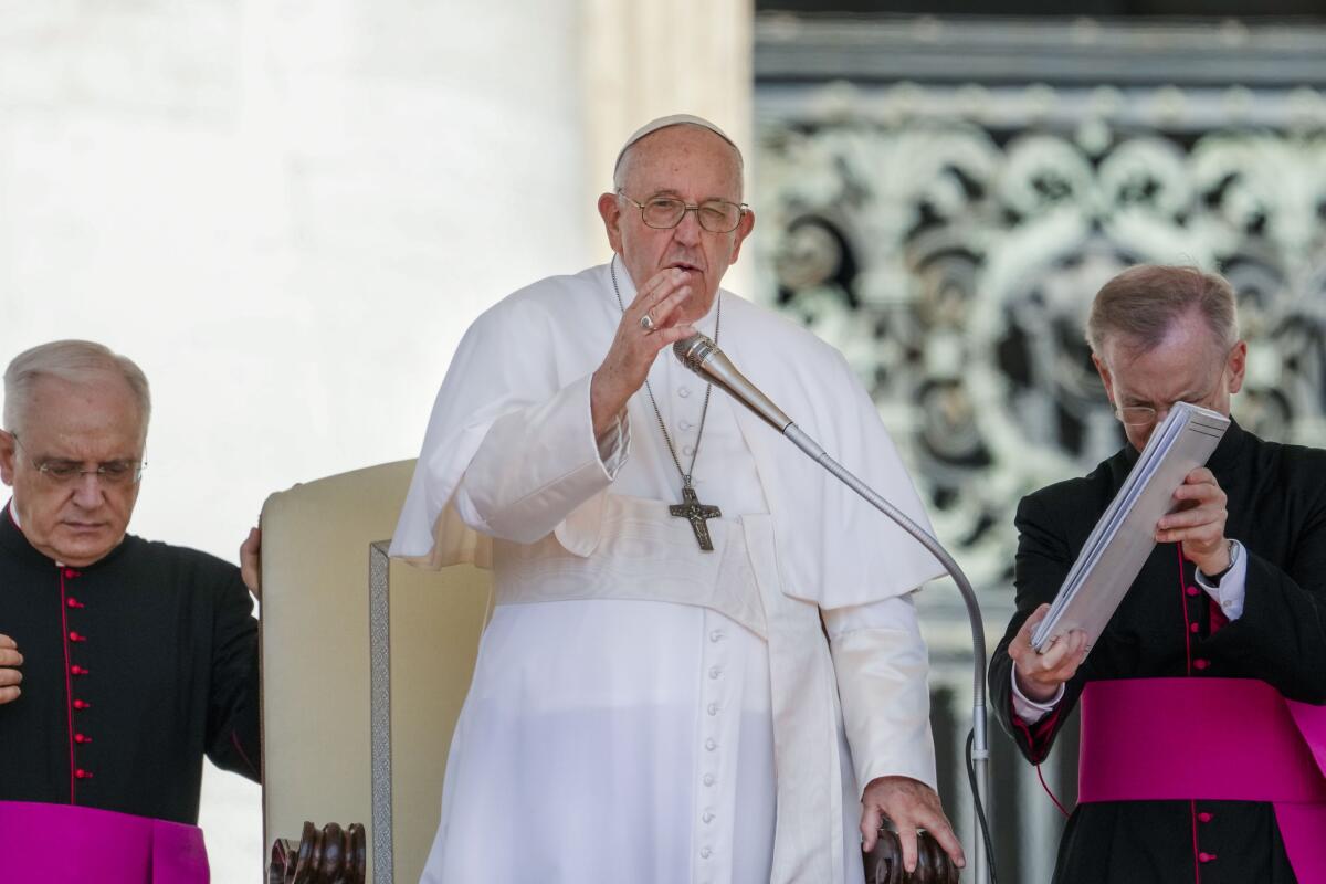 Pope Francis giving a blessing in St. Peter's Square