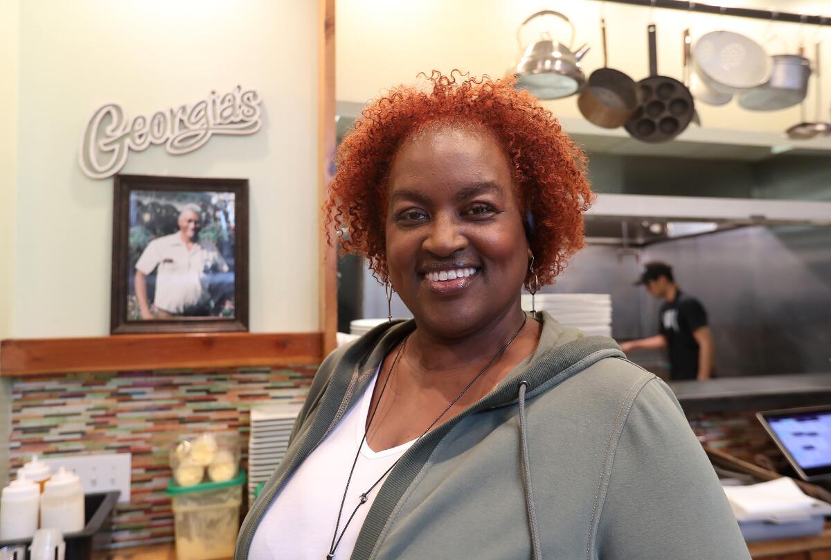 Nika Shoemaker-Machado stands in her Georgia's Restaurant in Anaheim.