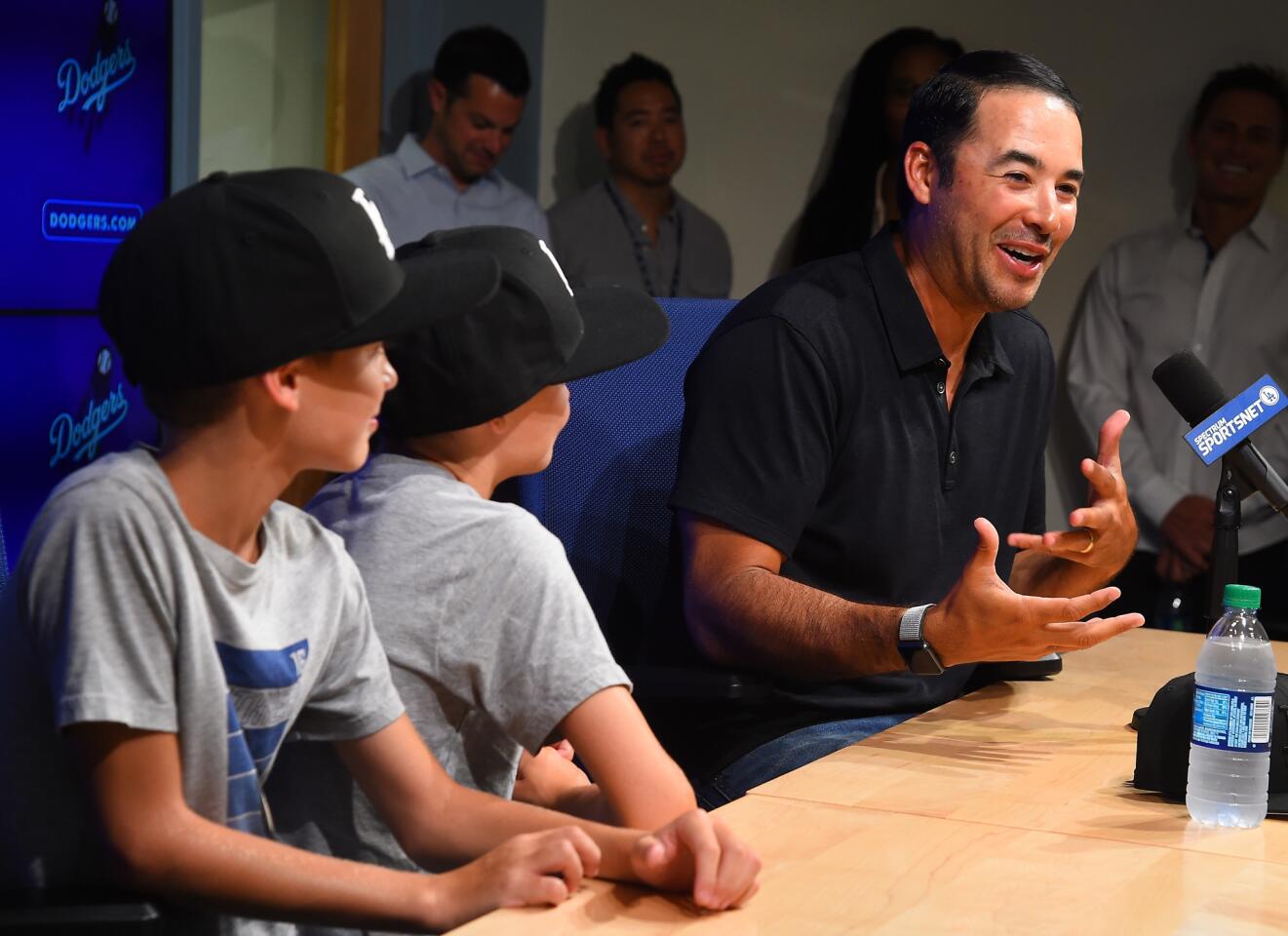 LOS ANGELES, CA - AUGUST 03: Former MLB player Andre Either answers questions from the media about his retirement as his sons Retton, 8 and Dreson, 10 look on before the game between the Los Angeles Dodgers and the Houston Astros at Dodger Stadium on August 3, 2018 in Los Angeles, California. (Photo by Jayne Kamin-Oncea/Getty Images) ** OUTS - ELSENT, FPG, CM - OUTS * NM, PH, VA if sourced by CT, LA or MoD **