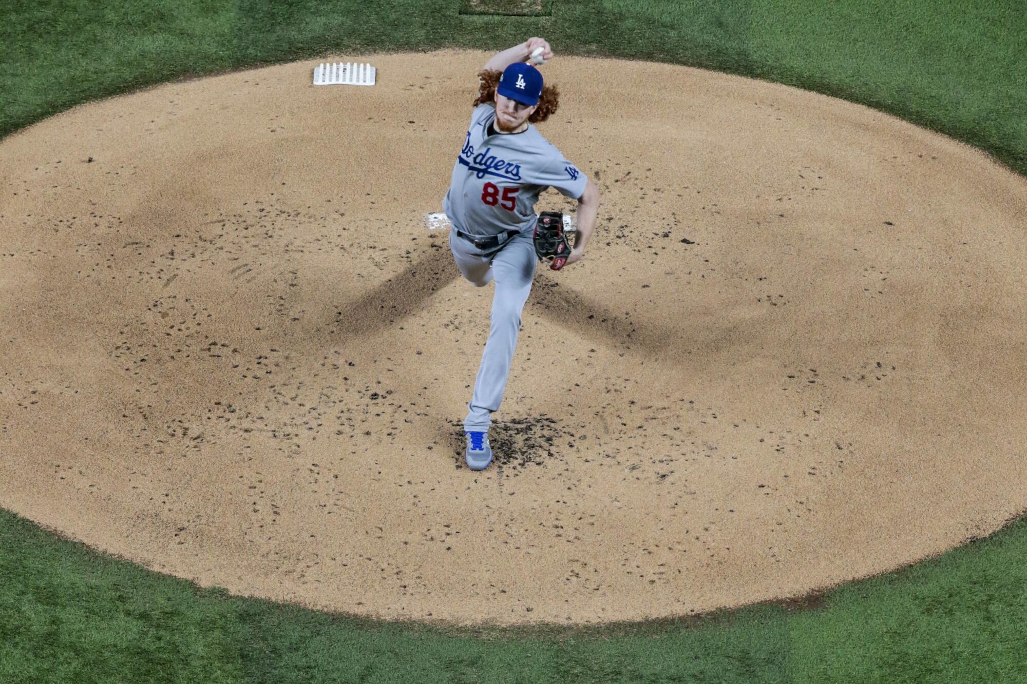 Dodgers starting pitcher Dustin May delivers during the first inning of Game 5.