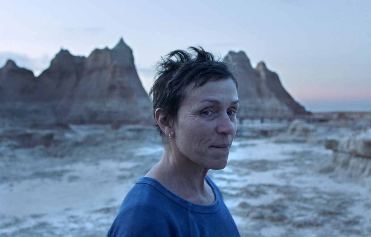This image released by Searchlight Pictures shows Frances McDormand in a scene from the film "Nomadland" by Chloe Zhao. The film won best feature at the Gotham Awards on Monday, Jan. 11, 2021. (Searchlight Pictures via AP)