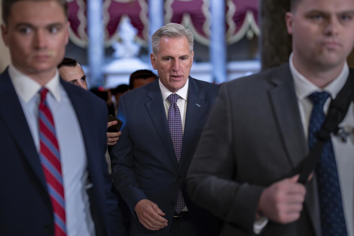 House Speaker Kevin McCarthy heads to the chamber to begin the week on Monday at the Capitol in Washington.