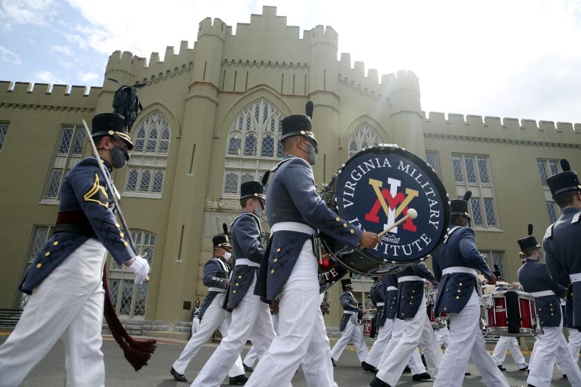 FILE - Virginia Military Cadets leave the barracks while participating in the annual end of the year parade on Friday, May 14, 2021, in Lexington, Va. The chief diversity officer of the nation’s oldest state-supported military college, Virginia Military Institute, has turned in her resignation amidst a debate among alumni over efforts to create a more inclusive environment. Jamica Love's resignation was announced Thursday, June 1, 2023. (Heather Rosseau/The Roanoke Times via AP, File)