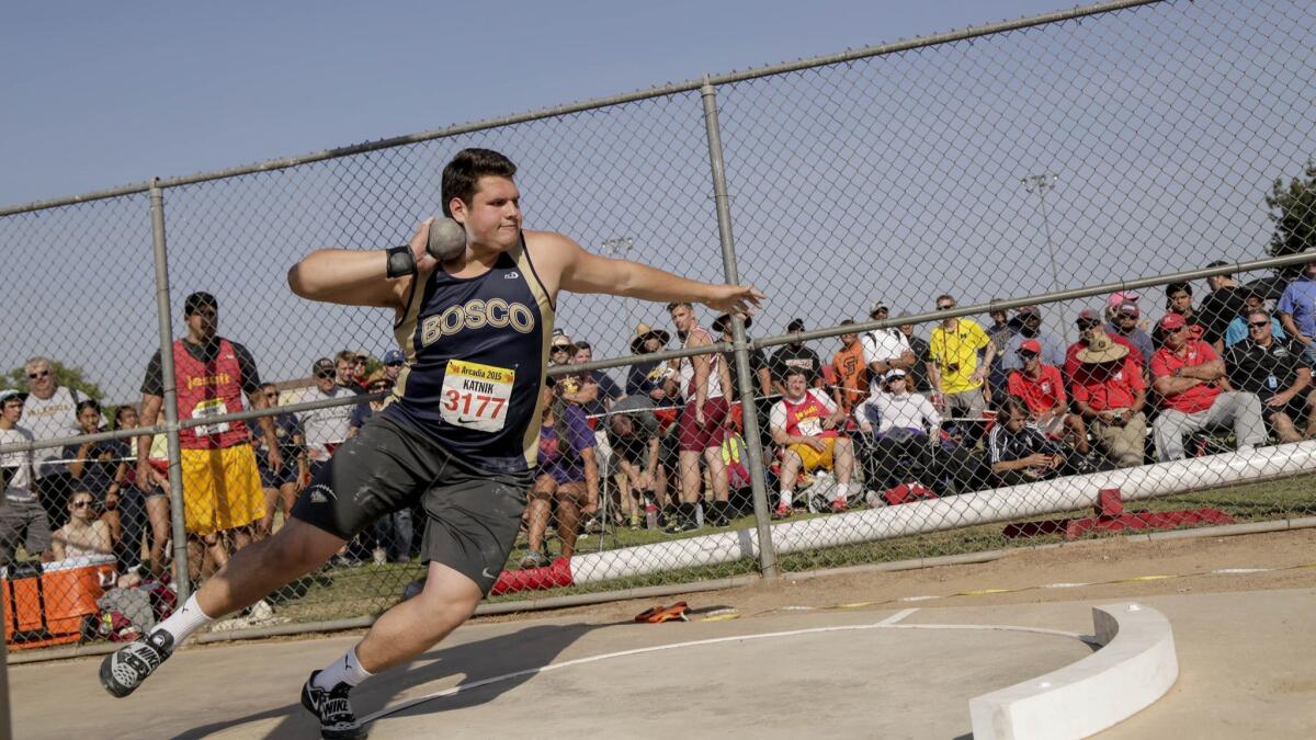 Matt Katnick throws during the shot put competition.