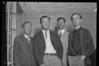 Upton Sinclair, left, Hunter Kimbrough, Pryns Hopkins and Hugh Hardyman in jail in a black and white photo