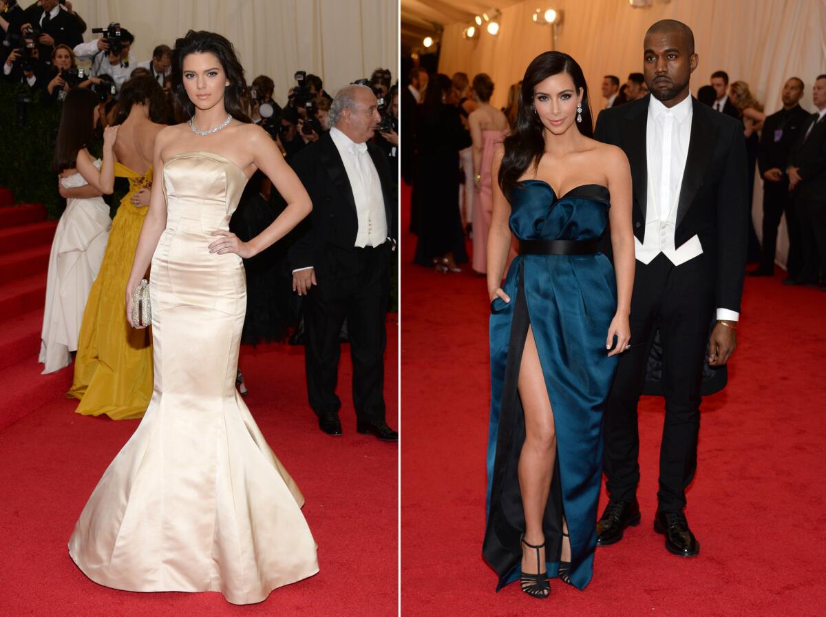 Kendall Jenner attends her first Met Ball with half-sister Kim Kardashian and her fiance, rapper Kanye West.