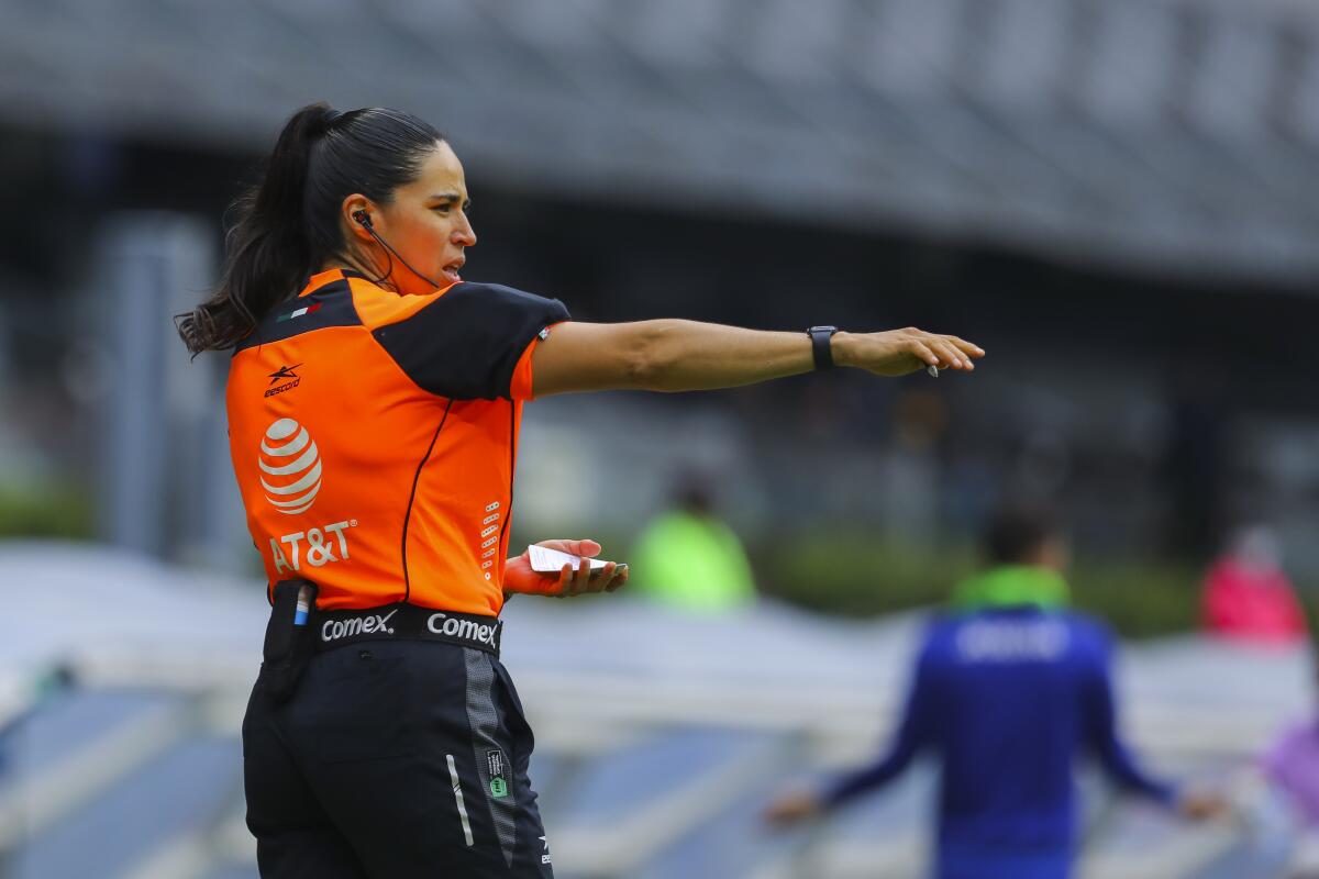 Karen Díaz Medina of Mexico officiates a Liga MX game Aug. 27 in Mexico City. 