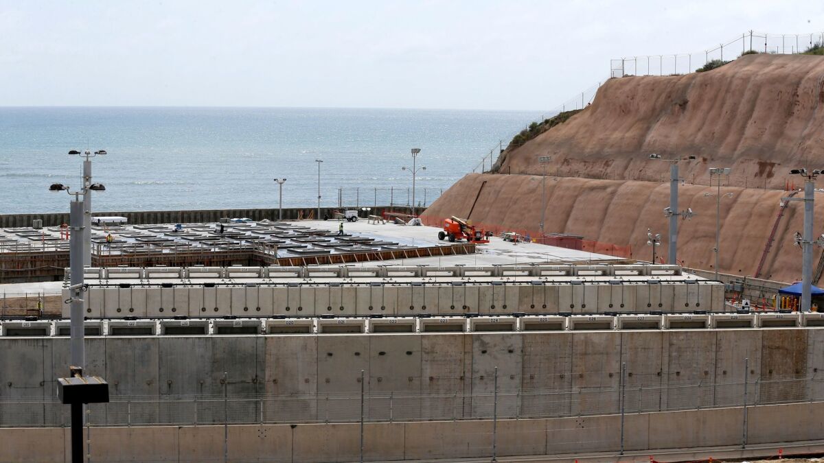 Construction is underway at the San Onofre Nuclear Generating Station for a storage site that will house spent nuclear fuel canisters in 2019. In the foreground is the storage site for 50 canisters that have already been placed on site. Photo from May 9, 2017.