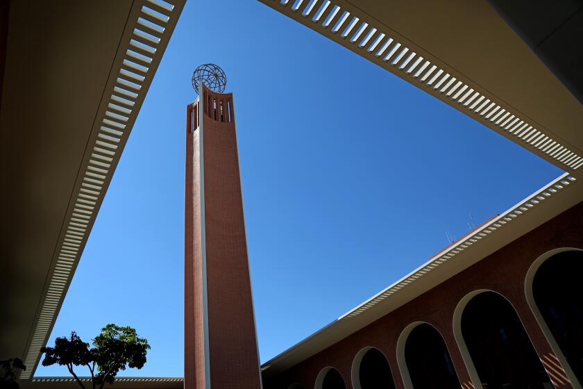 LOS ANGELES, CA - JUNE 11: Rufus B. von KleinSmid's name removed from the University of Southern California International relations building on Thursday, June 11, 2020 in Los Angeles, CA. von KleinSmid was the fifth president of the University of Southern California. (Gary Coronado / Los Angeles Times)