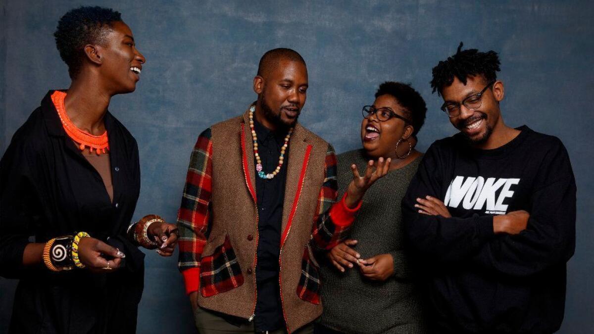 Co-director Sabbah Folyan, Kayla Reed, Tef Poe and co-director Damon Davis, from the documentary film, "Whose Streets," are photographed in the L.A. Times photo studio during the Sundance Film Festival.
