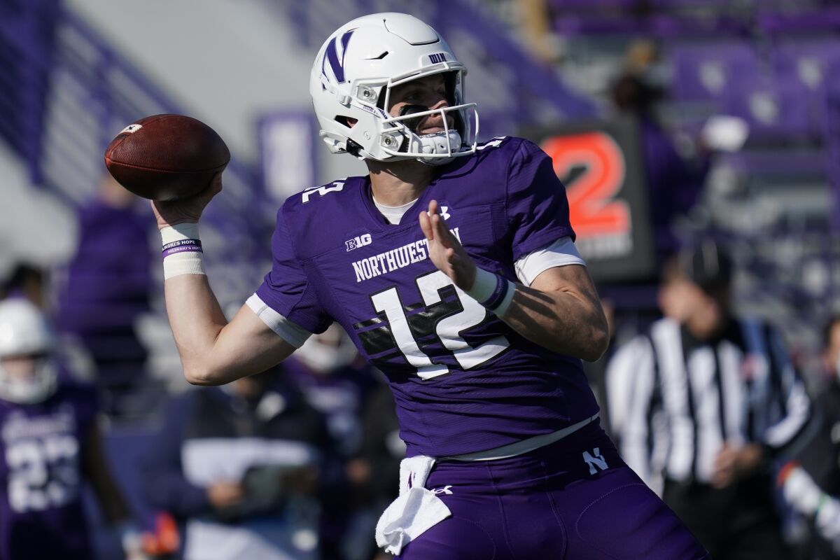 Northwestern quarterback Ryan Hilinski throws a pass against Rutgers during the first half of an NCAA college football game in Evanston, Ill., Saturday, Oct. 16, 2021. (AP Photo/Nam Y. Huh)
