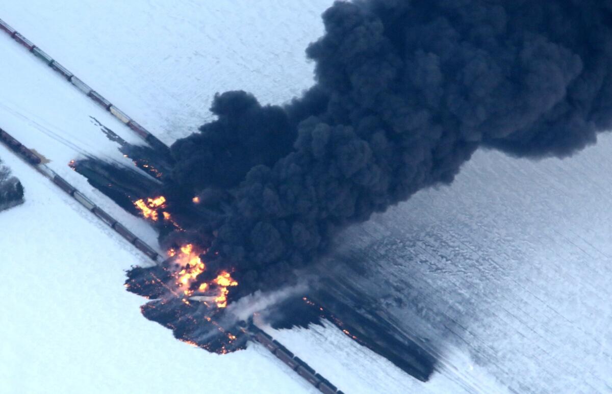 A fire from a train derailment burns uncontrollably west of Casselton, N.D. No injuries were reported.