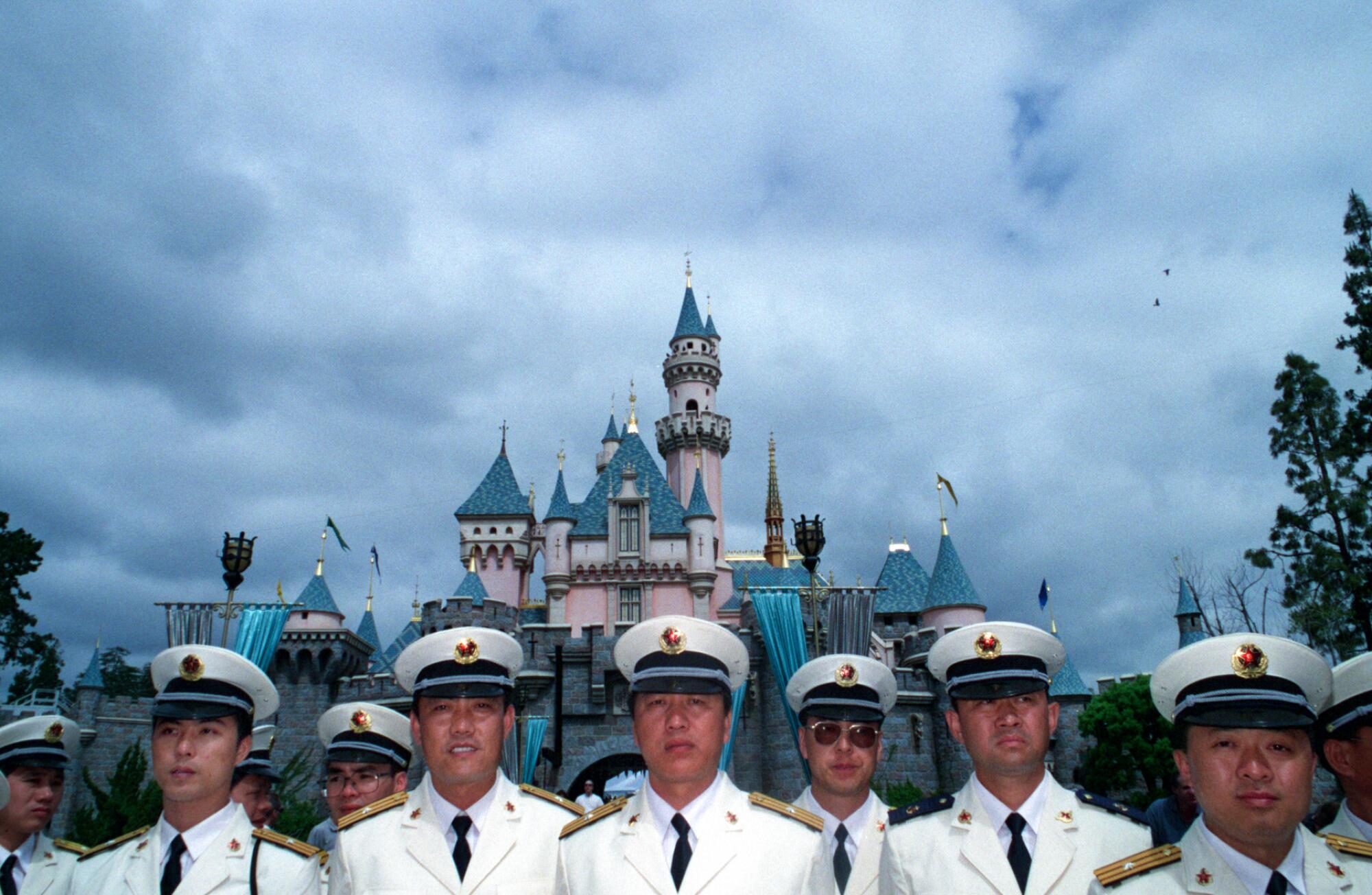 Navy men in white uniforms