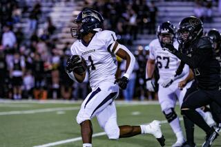 Dredon Fowles of Birmingham takes off on an 80-yard touchdown run on the first play against Calabasas