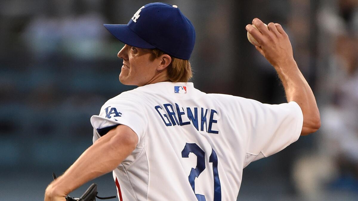 Dodgers starter Zack Greinke delivers a pitch against the Atlanta Braves on July 30.