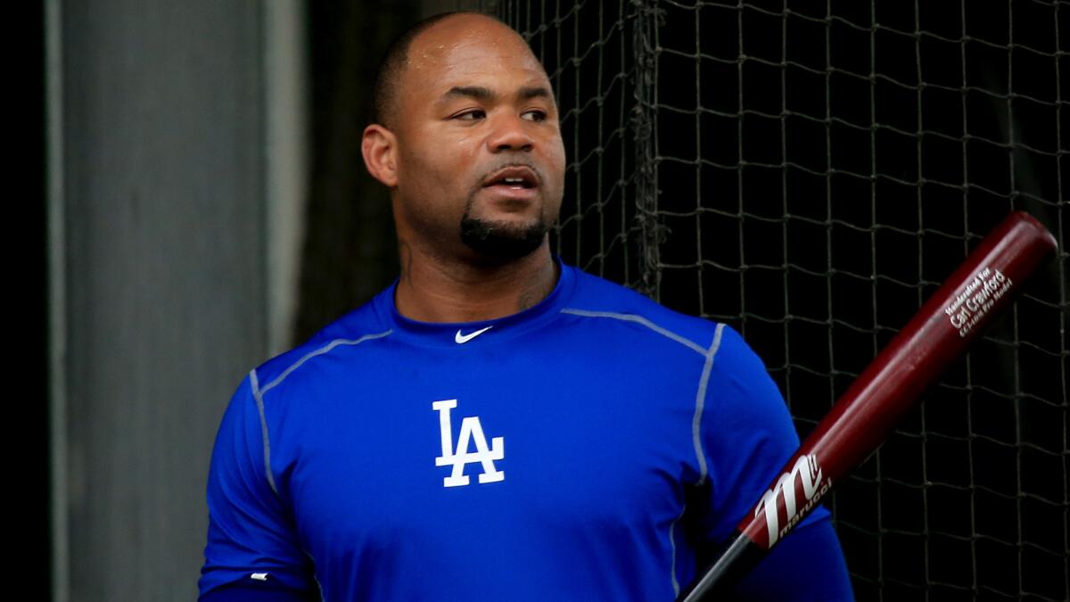 Former Dodgers outfielder Carl Crawford takes part in batting practice.