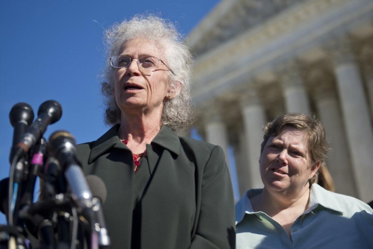 Linda Stephens and Susan Galloway, who challenged prayers at public meetings in Greece, N.Y., outside the Supreme Court on Wednesday.