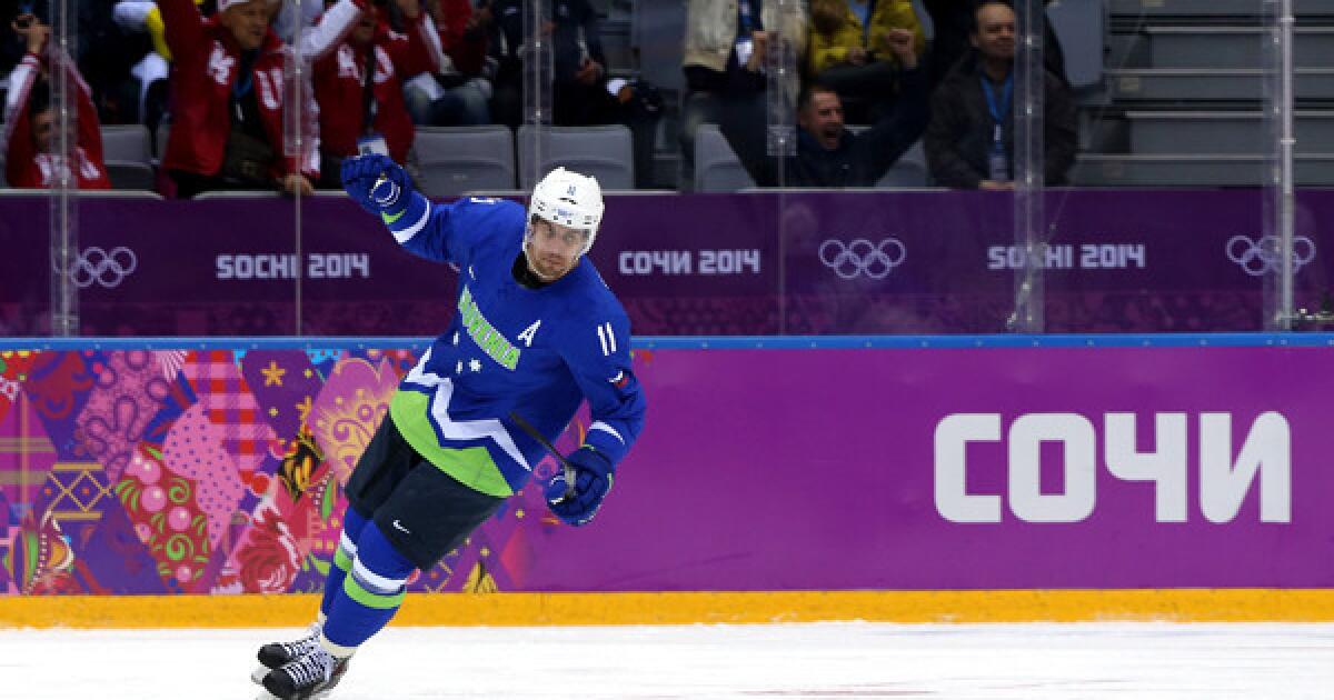 LA Kings Goaltender Jonathan Bernier wearing a Dodgers Hockey jersey.  Awesome!!