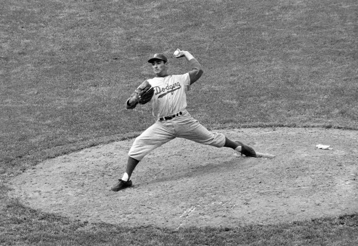 Sandy Koufax pitches for the Brooklyn Dodgers in May 1957.