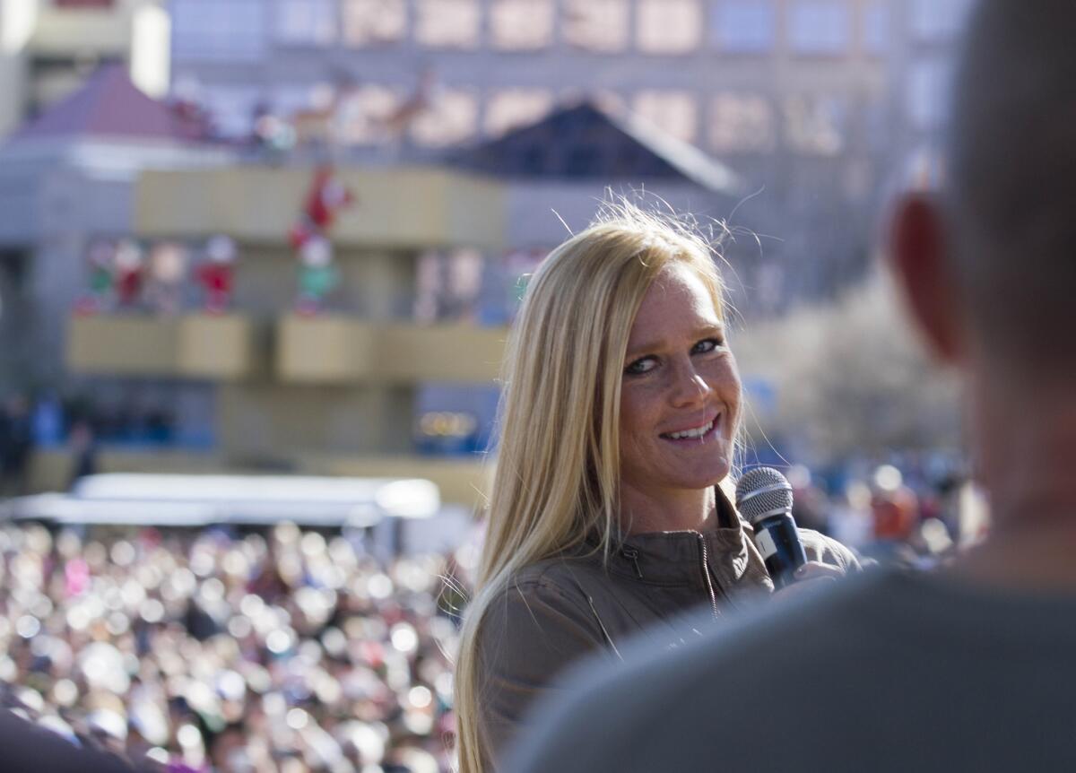 Holly Holm addresses a crowd of fans after a parade for the UFC women’s bantamweight champion in her native Albuquerque, N.M. in December.