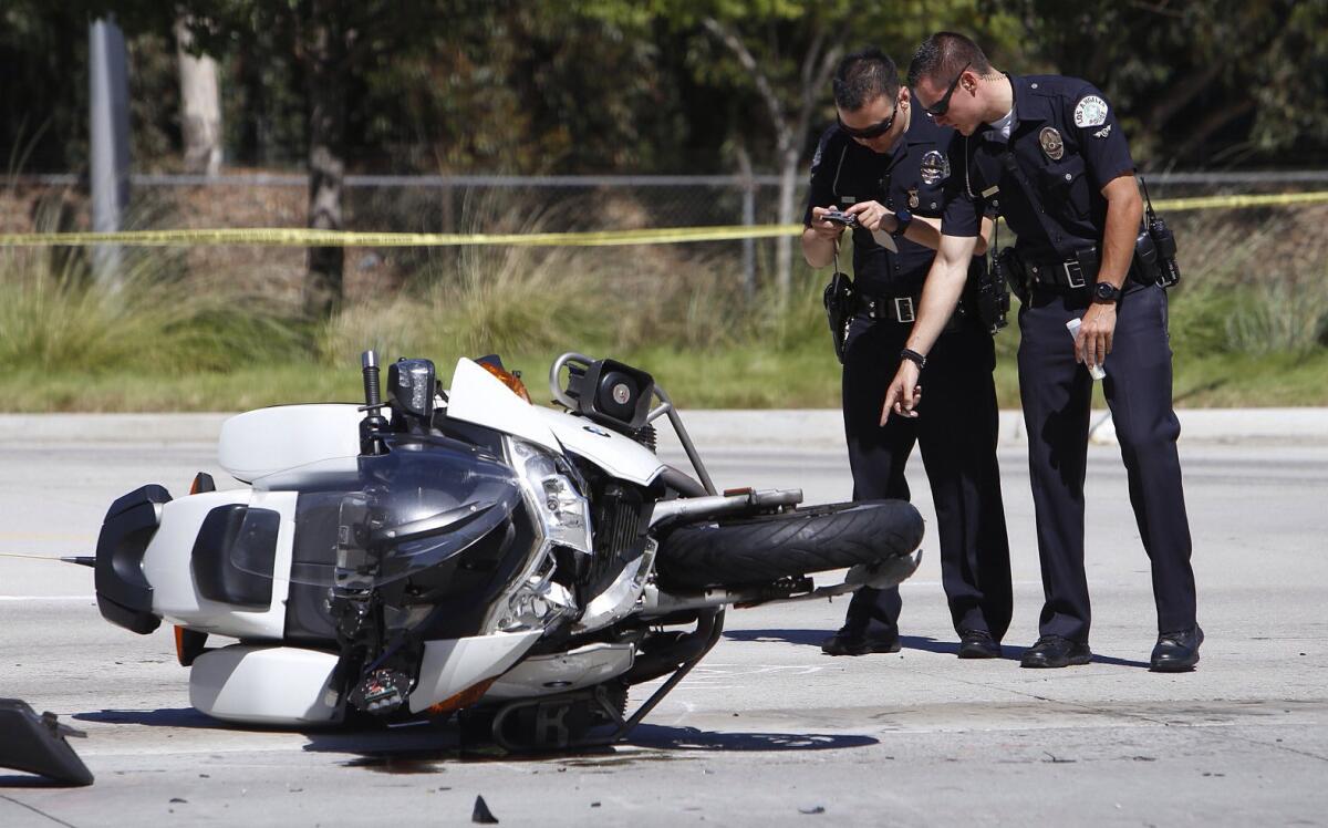 An investigation is underway into an accident, where a California Highway Patrol motorcycle officer was injured Monday in an apparent collision with a FedEx van Monday in Beverly Hills.