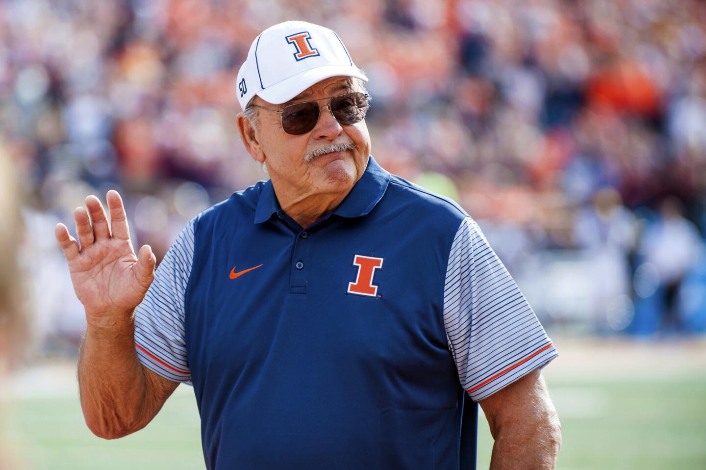 Dick Butkus, former Illinois and Bears linebacker, is recognized during a timeout as the first inductee of the Illinois Athletics Hall of Fame during a game against Minnesota at Memorial Stadium in Champaign on Oct. 29, 2016.