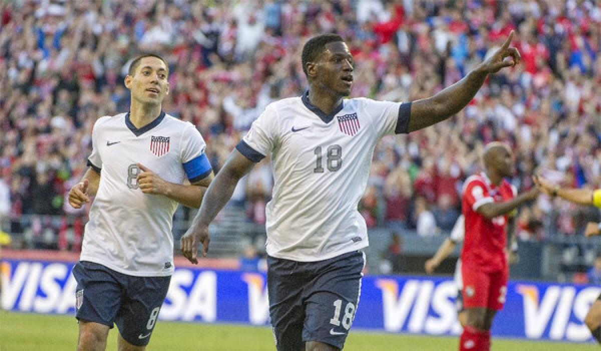 Eddie Johnson celebrates his goal with Clint Dempsey, left, during Team USA's 2-0 victory over Panama in a World Cup qualifying match in Seattle on Tuesday.