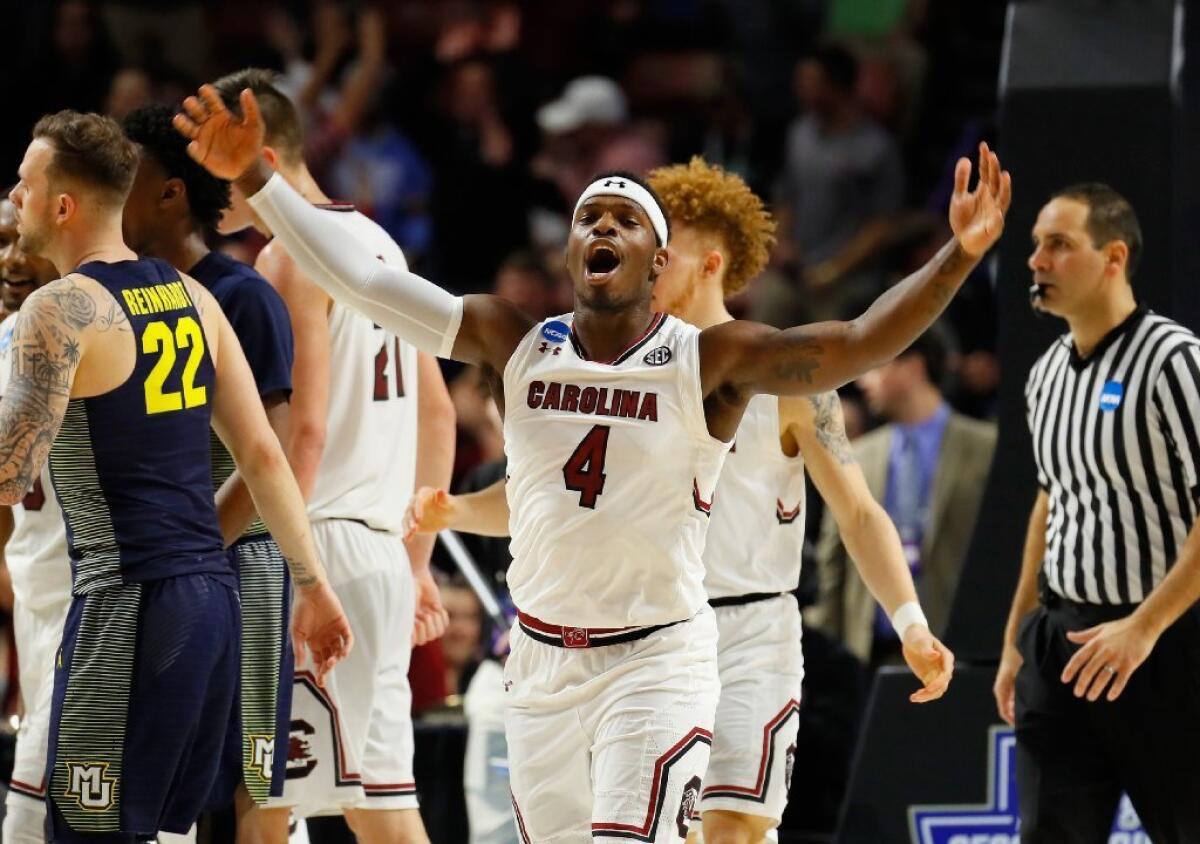 Rakym Felder of South Carolina celebrates his team's 93-73 win over Marquette during the first round of the 2017 NCAA tournament on March 17 in Greenville, S.C.