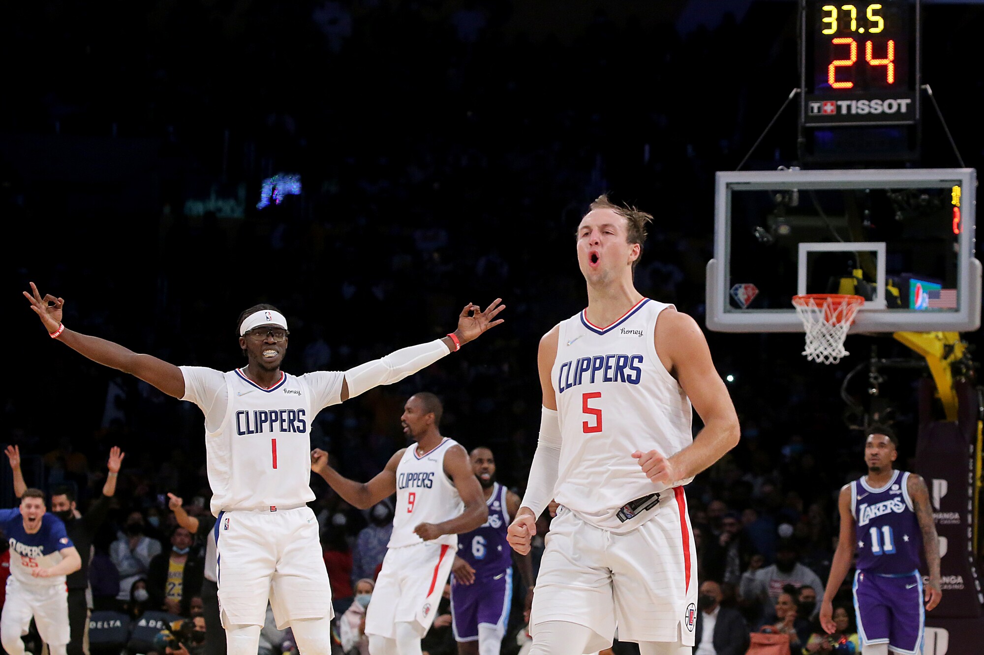 Clippers guard Luke Kennard celebrates after hitting a three-pointer.