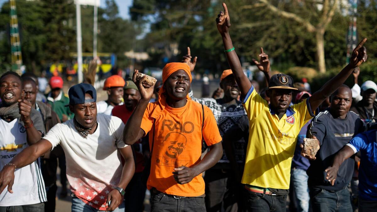 Supporters of Kenyan opposition leader Raila Odinga rally before a symbolic "People's President" swearing-in ceremony on Jan. 30.