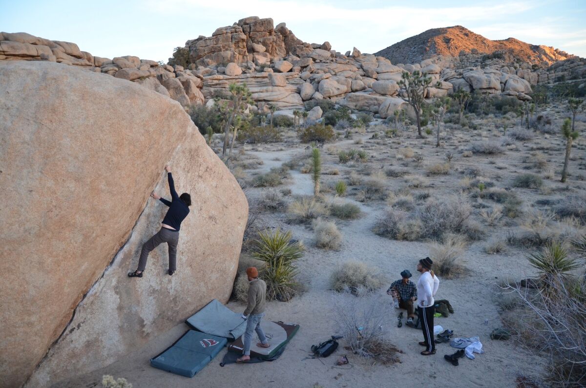 A group of boulder-lovers gathers near Barker Dam in Joshua Tree National Park. Photo taken in 2012.