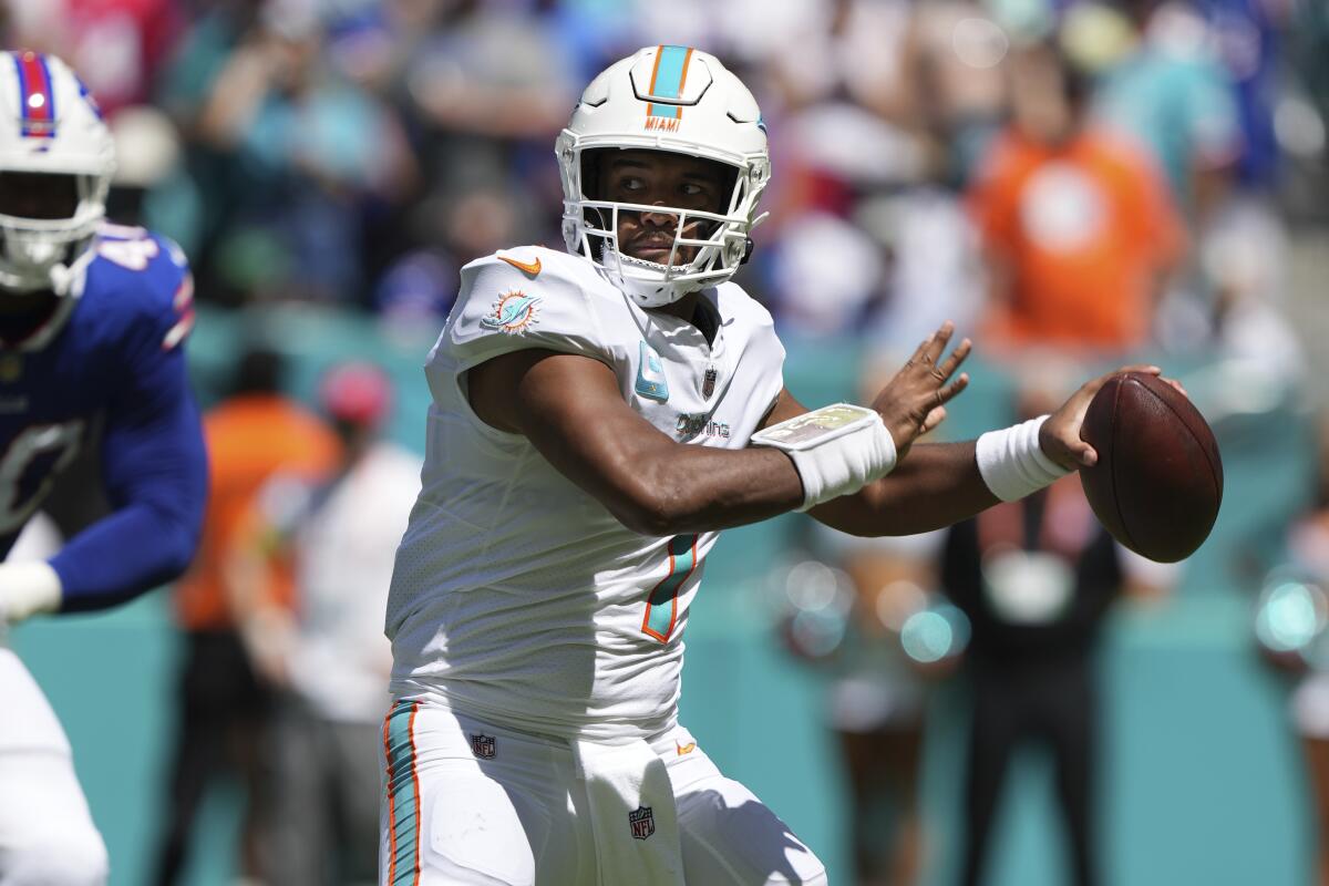 Miami Dolphins quarterback Tua Tagovailoa makes a pass attempt during a game against the Buffalo Bills.