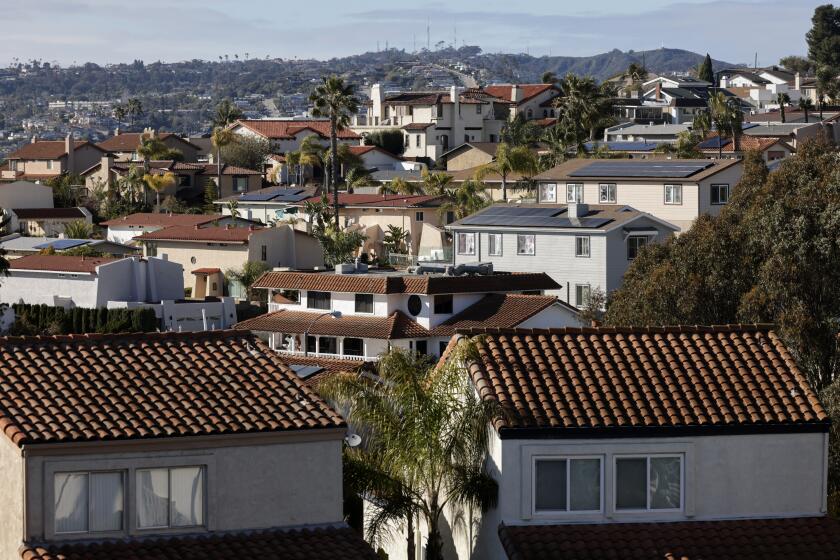 SAN DIEGO, CA - FEBRUARY 27, 2023: With Mt. Soledad in the background, a neighbourhood of homes viewed from above Clairemont Drive in San Diego on Monday, February 27, 2023. (Hayne Palmour IV / For The San Diego Union-Tribune)