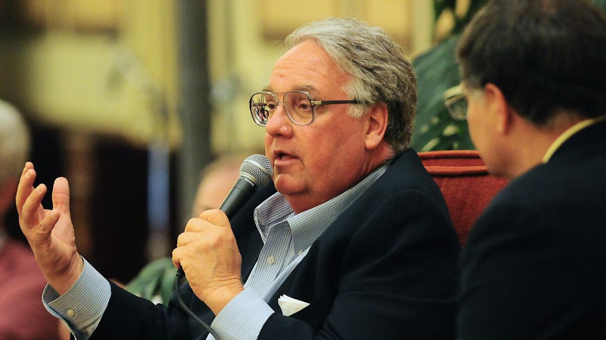 Howard Buffett, in file photograph, has used his charitable foundation to support various causes, including development projects and bolstering police agencies.