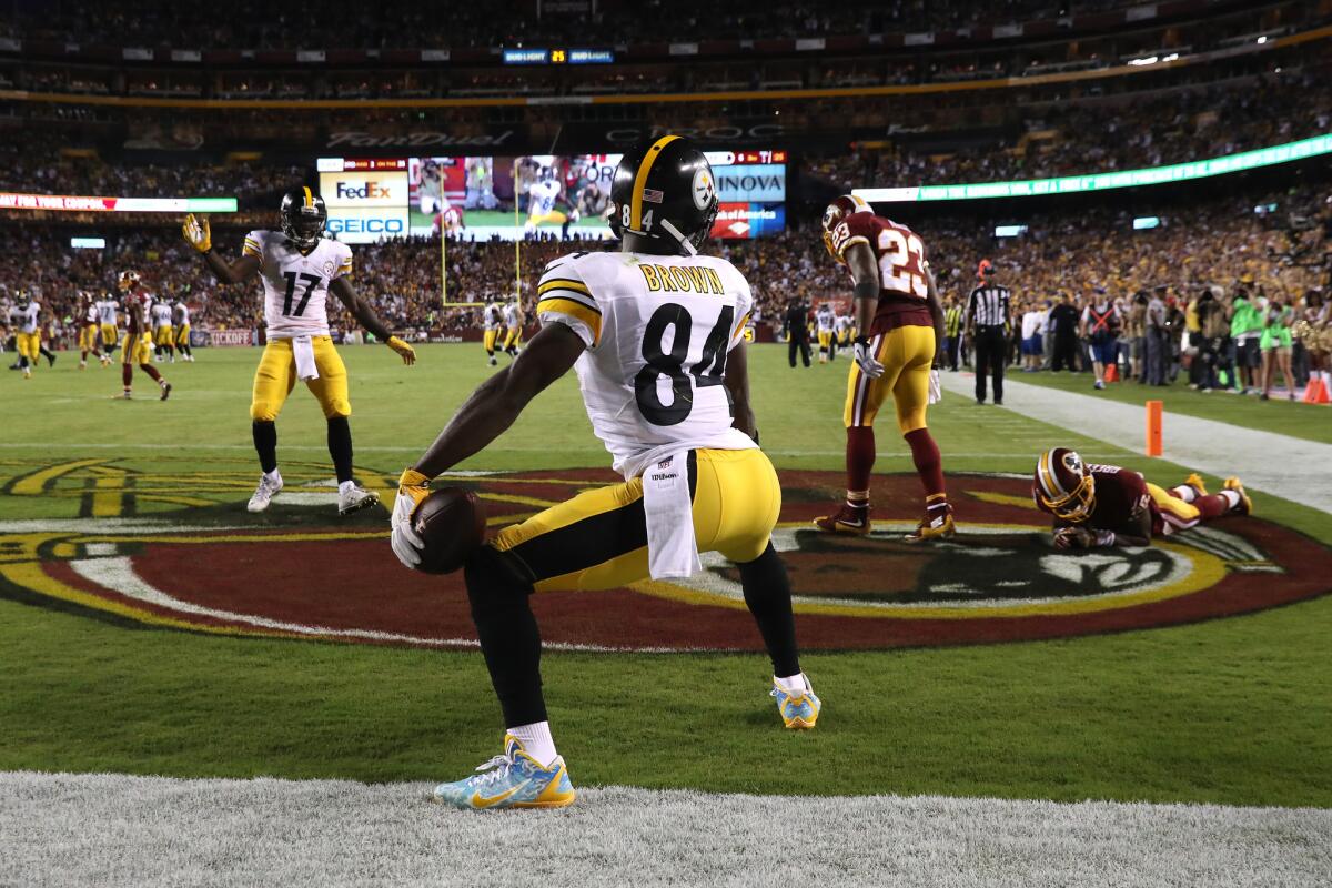Steelers' Antonio Brown celebrates after a touchdown against Washington on Monday.