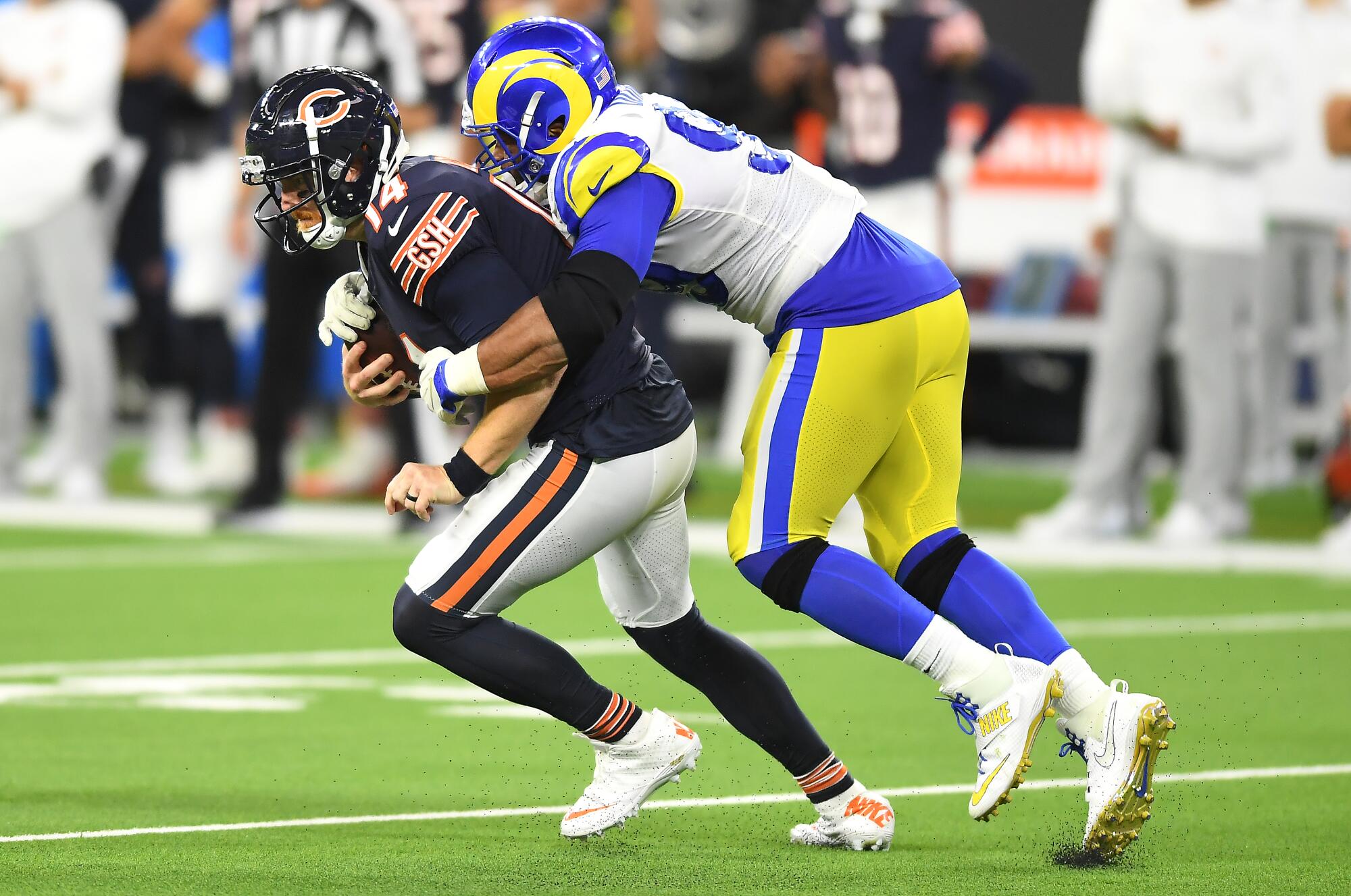 Los Angeles Rams defensive lineman Aaron Donald sacks Chicago Bears quarterback Andy Dalton