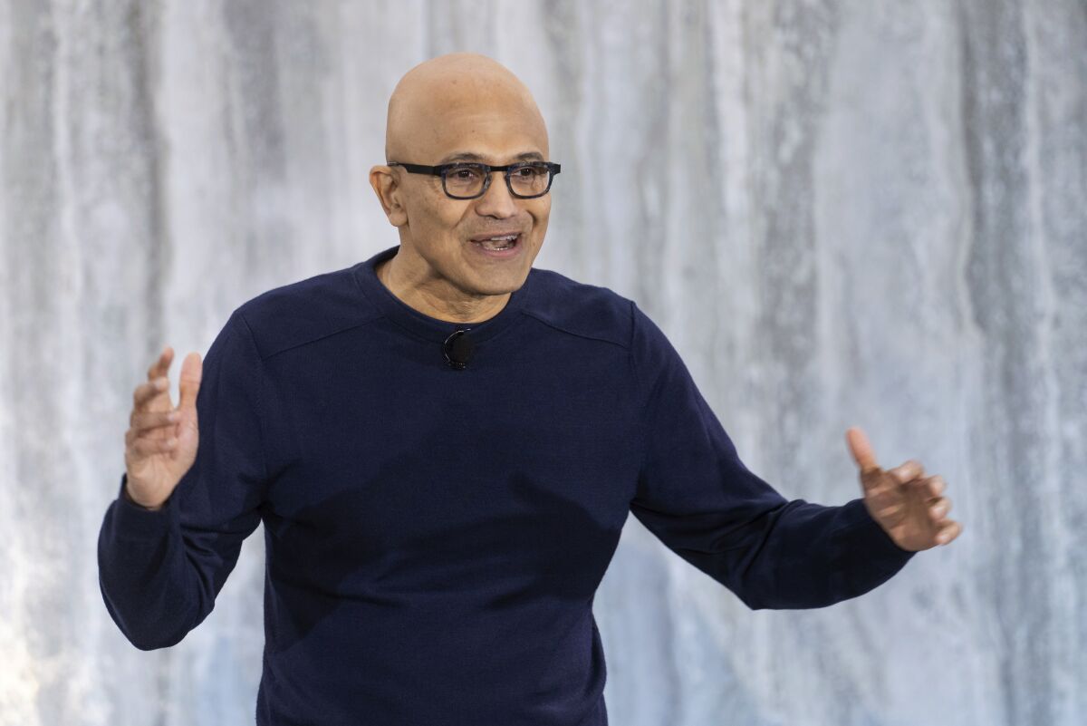 Microsoft Chief Executive Satya Nadella with his hands extended.